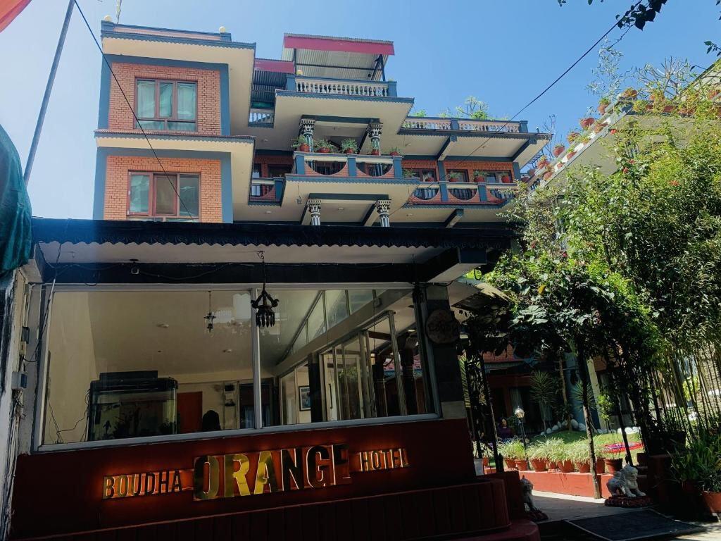 Street-level entrance of Boudha Orange Hotel in Boudha